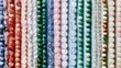 © Suger Bloom - Colorful gemstone bead strands in vertical lines
