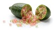 © Hello World - Finger lime cut in half displaying translucent pink and green vesicles spilling out of the dark green rind on a clean white surface.