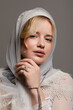 © LIGHTFIELD STUDIOS - Stylish young woman in a veil exudes elegance and grace