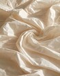 © Vines 2 - Soft ivory crumpled paper with gentle folds and shadows creates a clean and minimalist textured background for photography.