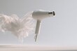 © IQRA - A sleek hair dryer floats in a simple space showcasing its design. Soft fabric moves in the air enhancing the beauty tech appeal of the product