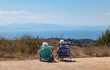 © Paolo Corazza - Andalusia, Spain. September 29, 2026. Two senior women looking at Strait of Gibraltar and Africa