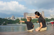 © leungchopan - Mother and son pointing at river view in taiwan