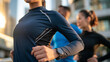 © Laura - Faceless diverse couple in the city with pride in their workout together, wellness hobby and collaborative outdoor training, with copy space