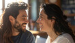 © ezra - A Shared Moment of Laughter: A man and woman share a heartwarming moment, their eyes meeting as they burst into laughter, radiating warmth and connection.