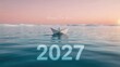 © Tanvir - A paper boat floats on calm water representing happy new year 2027 concept