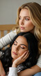 © Inspire Shots Hub - Two women with closed eyes in close embrace, symbolizing intimacy, trust, and deep connection, representing peaceful companionship and emotional support