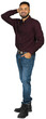 © fotofabrika - Man posing with a smile while standing in casual attire with a hand on his head