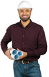 © fotofabrika - Construction worker holds rolled blueprints while smiling in the office setting