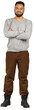 © fotofabrika - Man standing with arms crossed in casual gray sweater and brown pants
