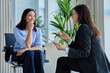 © Valerii Honcharuk - Female candidate talking to HR manager with clipboard during job interview in office