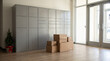 © Matube - Wall of grey parcel lockers in a bright apartment building lobby with cardboard shipping boxes stacked in front and a small holiday plant, package delivery during the holiday season