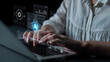© InfiniteFlow - A close-up view of hands typing on a laptop, surrounded by transparent visualizations of data and technology, illustrating the integration of artificial intelligence in business workflows. Nascent