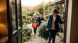 © WOW - Multi generational family gathering together outside winter front door during festive christmas holidays celebrating with wrapped presents and warm loving smiles under bright seasonal lights