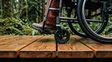 Wheelchair wheels cross textured timber boardwalk