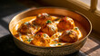 © Suresh Thangavel - Soft paneer kofta in creamy cashew gravy creates a luxurious vegetarian Indian restaurant composition.