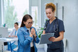 © Valerii Honcharuk - Doctor discussing diagnosis with anxious mature patient holding clipboard clinic