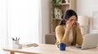 © Kateryna - Ophthalmology: Asian remote worker rubbing tired eyes after prolonged laptop use at home
