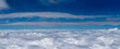 © Cavan Images - Beautiful panoramic view from above the clouds