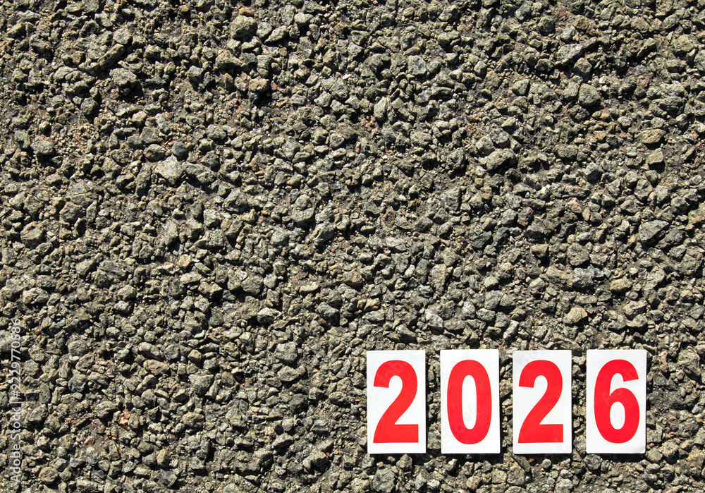 Studio Fire Backgrounds Huge numbers of 2026 year. Paper square numbers on the stone road ...
