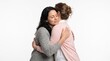 © Zanzaa - Two women embracing warmly, one with eyes closed and a gentle smile, conveying comfort and connection