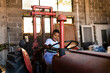 © Jelena Markovic/Stocksy - Childhood Adventure in a Rural Workshop