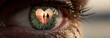 © thodonal - Eye reflecting a couple holding hands inside a heart