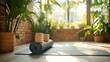 © wahyu - Yoga mat and blocks in a bright, plant-filled studio