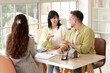 © Pixel-Shot - Real estate consultation and home buying, couple talking to agent about mortgage and property investment in modern office with house model on desk