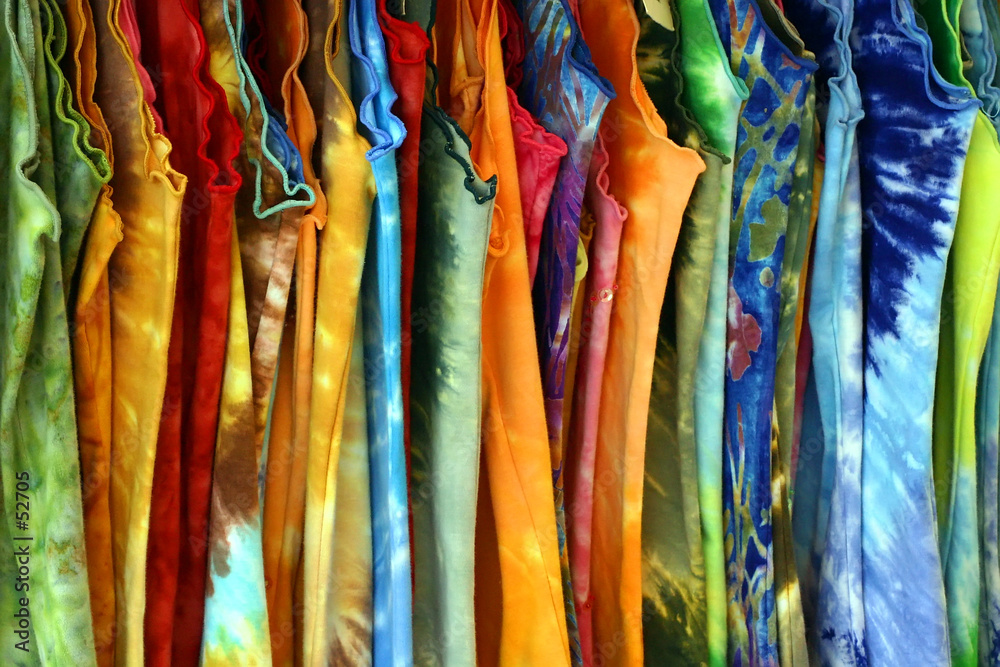 several  women's multicolored summer dresses