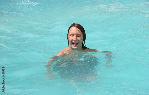 male teen swimming