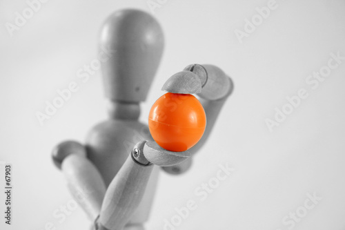 woody holding a orange ball