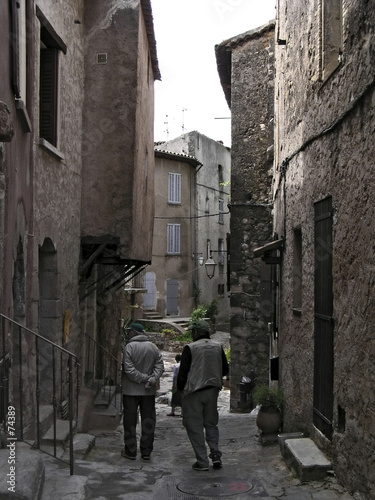 senior tourists in medieval hamlet of provence  France