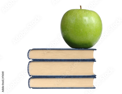 books and green apple