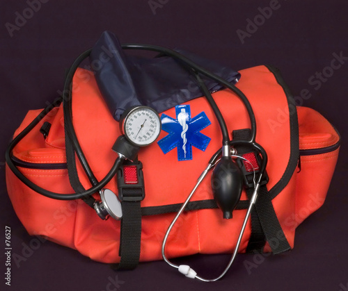 first aid bag, stethoscope and blood pressure cuff photo