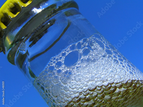 bottle neck against clear blue sky