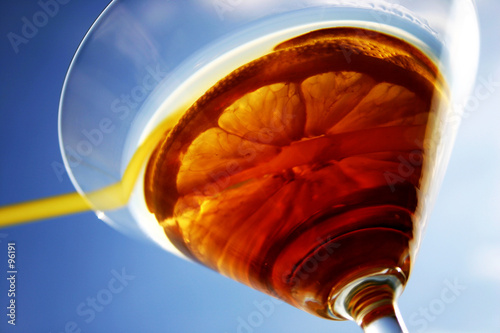 martini close-up, glass and lemon, detailed