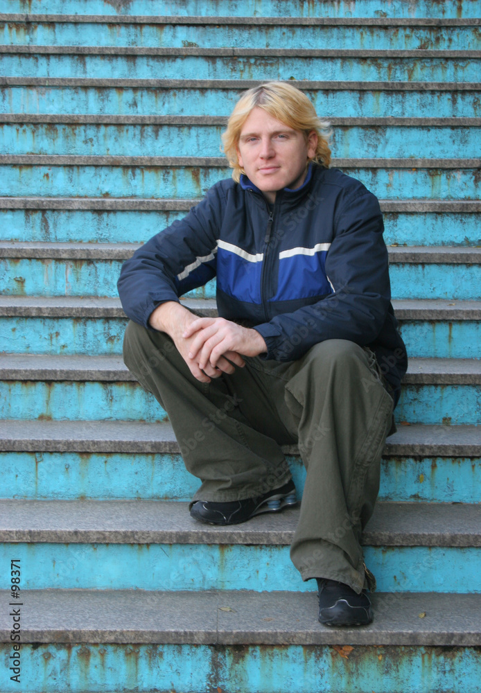 man sitting on steps man sitting on steps