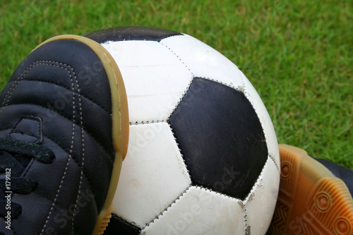 a soccer ball and a pair of shoes