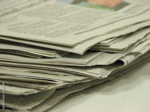 stacked newspapers