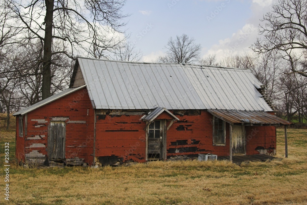 abandoned red house