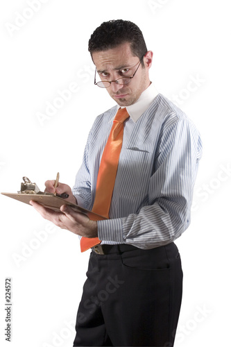 businessman looking over his glasses with clipboard on hand - fr