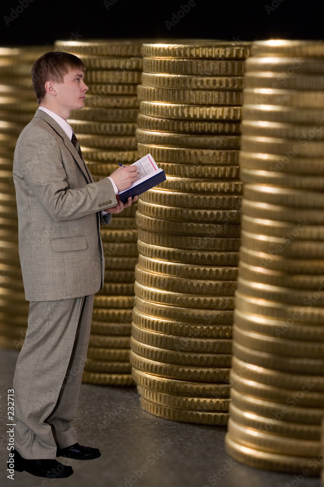 Fotografie young businessman count money
