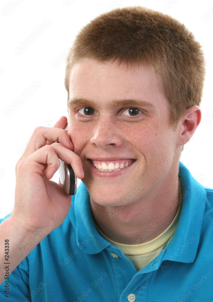 cute male teen on cellphone