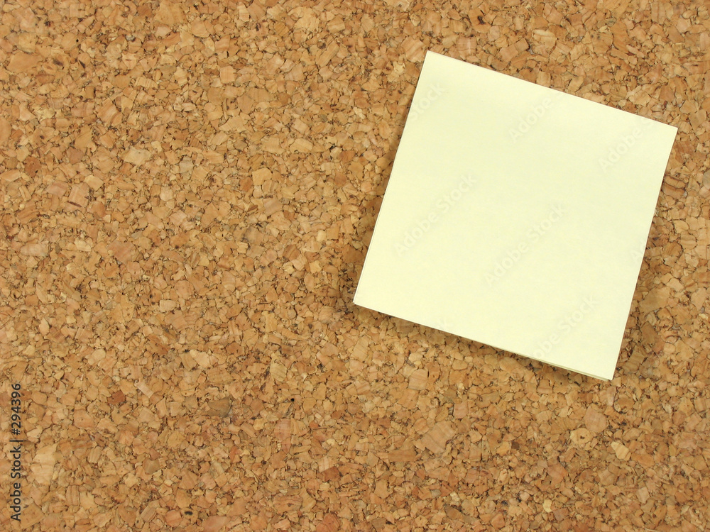 blank note on corkboard blank note on corkboard