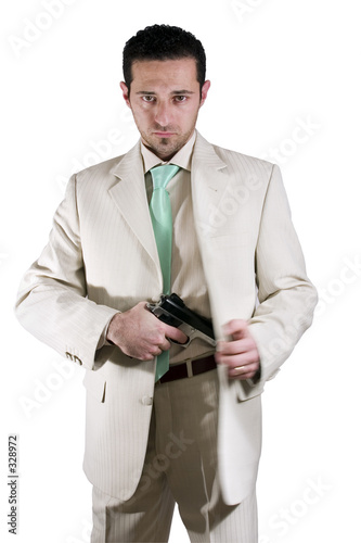 man pulling out his gun