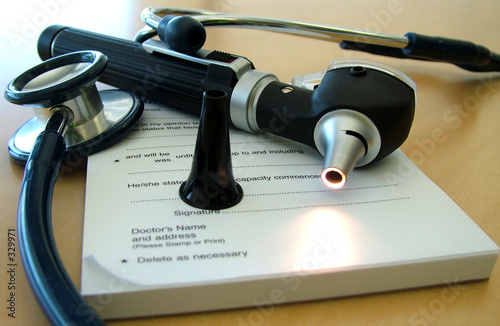 doctors tools of the trade on desk photo