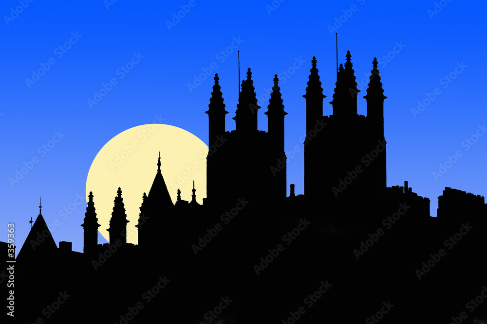city silhouette at night with moon