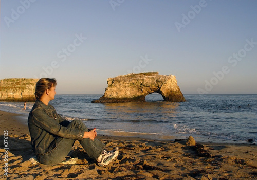woman relaxing on the beach photo