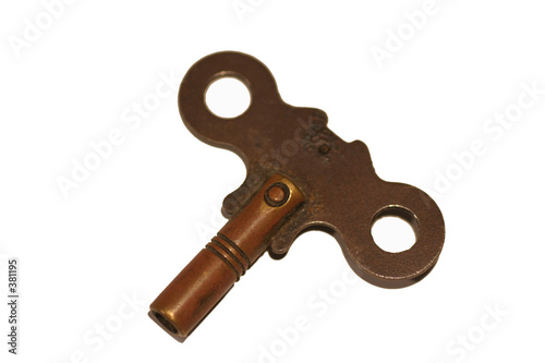 old clock key on white